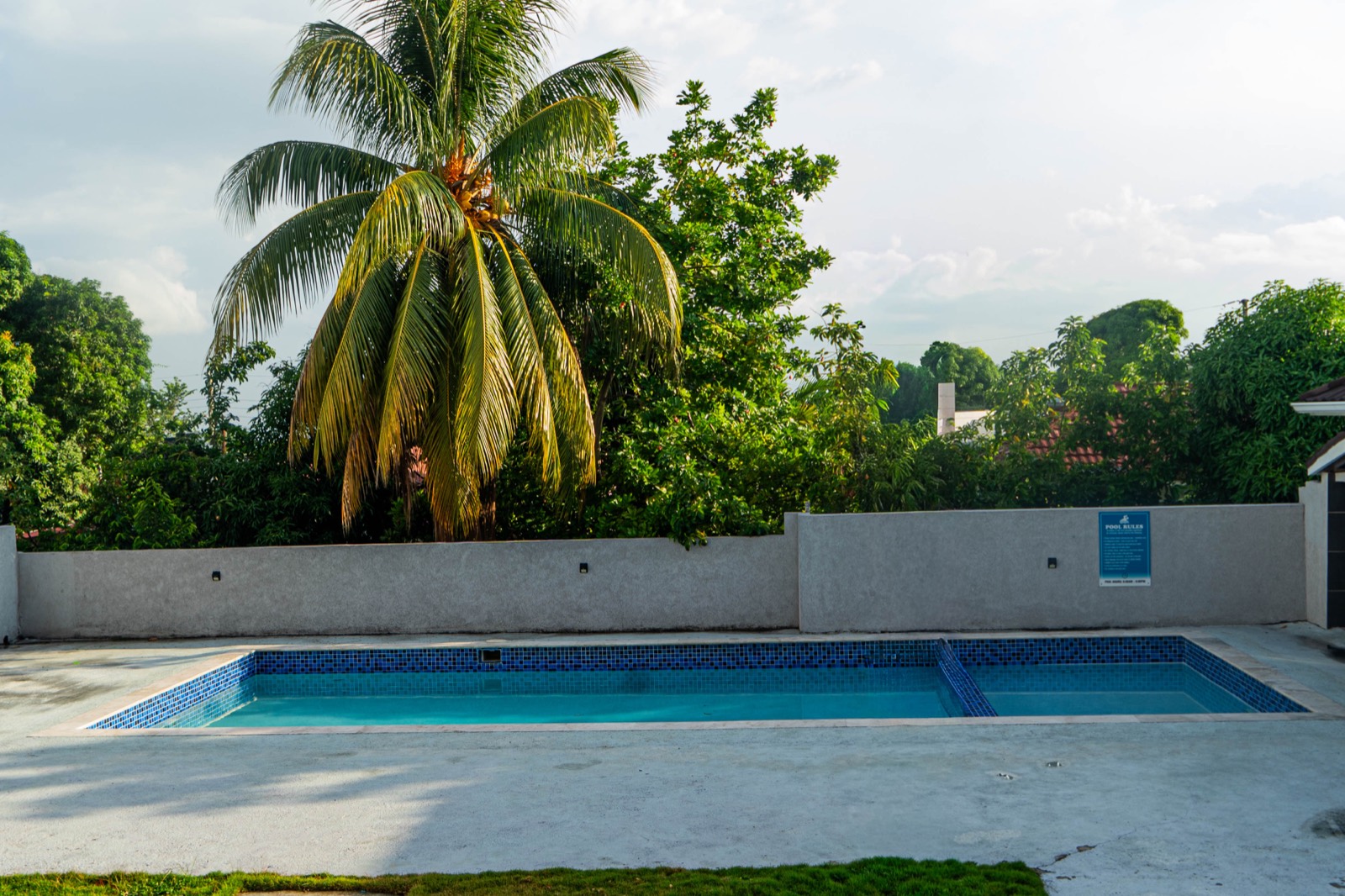 Swimming pool on the grounds of Abia The Condominiums